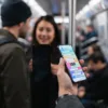 iPhone with privacy screen protector blocking side-view visibility