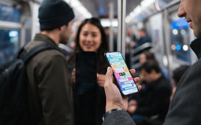 iPhone with privacy screen protector blocking side-view visibility